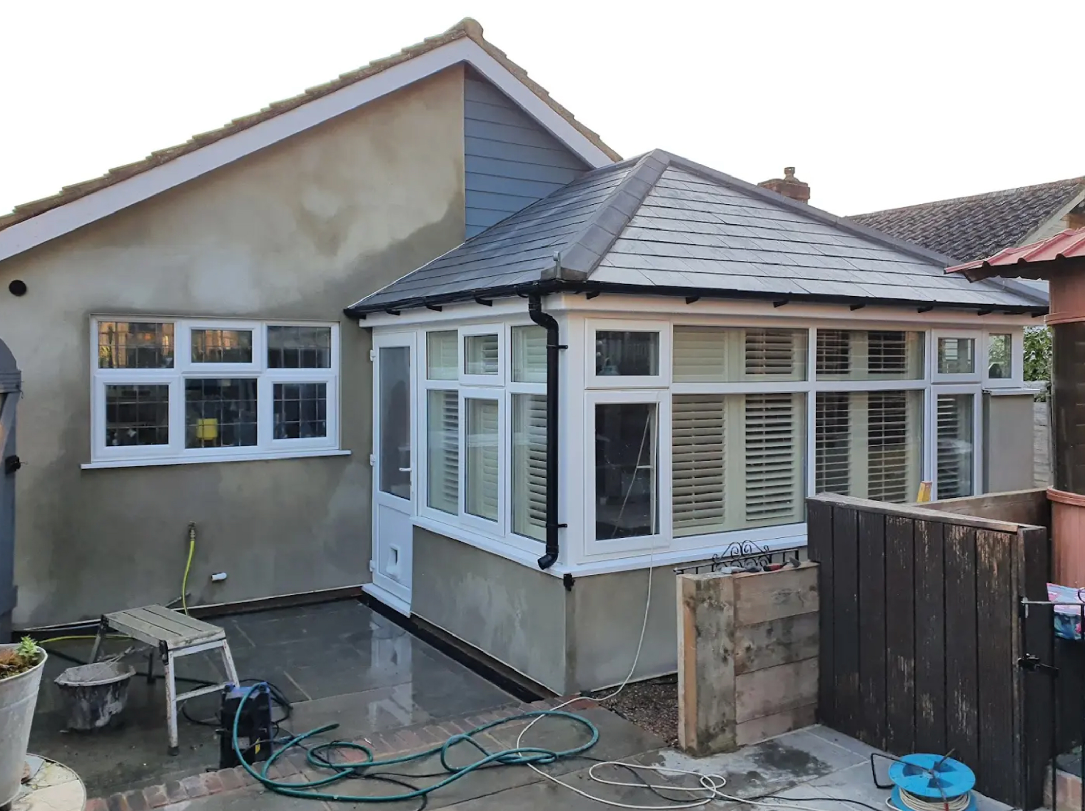 Bungalow new render, and replacement of conservatory roof